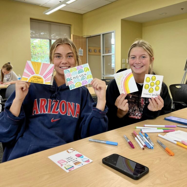 volunteers write encouragement cards